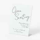 Search for take a seat signs Script