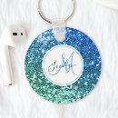 Search for sea rounded key rings For her