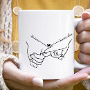 Search for hand holding mugs For her