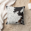 Search for cowhide cushions Country