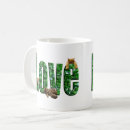Search for kitten playing mugs Cat