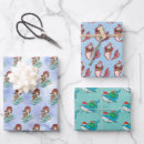 Search for mermaid christmas wrapping paper Santa