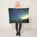 Search for aurora borealis blankets Snow