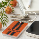 Search for black orange rectangular key rings For him