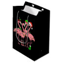 Search for christmas flamingo gift bags Santa