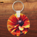 Search for black orange round key rings Flower