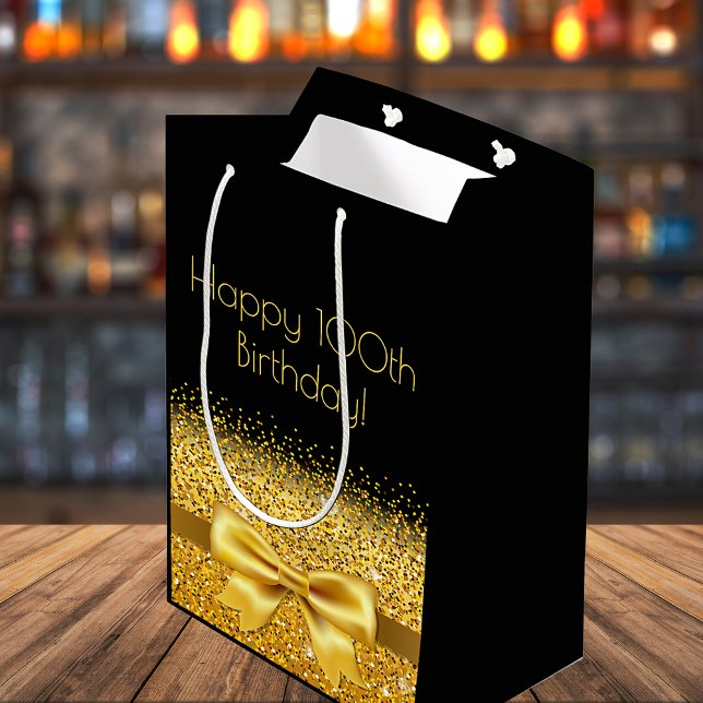 100th birthday black gold bow medium gift bag (Creator Uploaded)