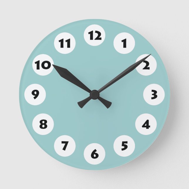 12 Spots - Black with White on Lt Blue Green Round Clock (Front)