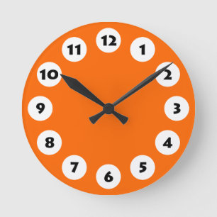 12 Spots - Black with White on Orange Round Clock
