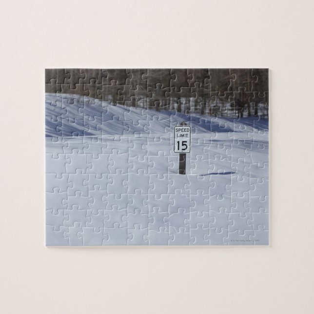 15 mph sign buried in snow jigsaw puzzle (Horizontal)