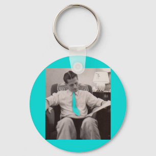 1930s reading the paper key ring