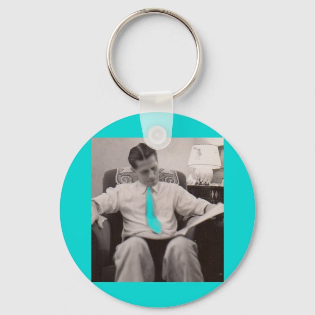 1930s reading the paper key ring (Front)