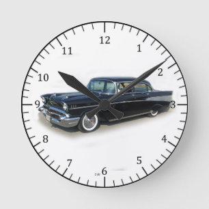 1957 black 4 door classic car clock