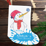 1st Christmas Cute Snowman Snowflake Drawing Small Christmas Stocking<br><div class="desc">1st Christmas Cute Snowman Snowflake Drawing Christmas Stocking. Cute snowman with a snowflake on his nose. The background is a blue colour splash with white snowflakes. Easy personalise with your name and year of birth.</div>