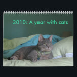 2010: A year with cats Calendar<br><div class="desc">Enjoy the year 2010 with a calendar all about cats. Various cats displaying their funny personalities.</div>