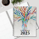 2023 Custom Name Planner<br><div class="desc">This unique Planner is decorated with a brightly coloured tree. The original design was made in mosaic using tiny pieces of glass. Customise it with your name and year. To edit further use the Design Tool to change the font, font size, or colour. Because we create our artwork you won't...</div>
