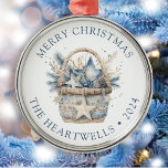2024 Personalised Blue Basket Merry Christmas Metal Ornament<br><div class="desc">This holiday ornament features a watercolor rustic basket filled with blue and beige holiday star ornaments and pine sprigs. The words "Merry Christmas" appear in blue serif font,  with your family's name and the year below.</div>