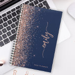 2025 Personalised Navy Blue Rose Gold Glitter Planner<br><div class="desc">Personalise this elegant modern design with your name in vertical rose pink signature handwriting script on a navy blue background trimmed with a rose gold faux glitter border. Add the year in sans serif font. (To keep the swashes at the beginning and end of the name, replace only the letters,...</div>