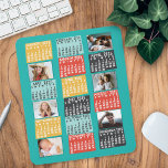 2025 Year Monthly Calendar Modern Photo Collage Mouse Pad<br><div class="desc">This personalised 2025 year monthly calendar mousepad has a mid-century modern geometric look with asymmetrical colour blocks and cut-out paper style typography. Use the easy templates to add six of your favourite photos (horizontal work best, but all shapes will automatically adjust to fit the frames). This vibrant, ultra-mod calendar will...</div>