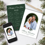 2026 Elegant Pine Arch Christmas Photo Calendar Holiday Card<br><div class="desc">2026 Elegant Arch Botanical Christmas Calendar Photo Holiday Card featuring your favourite photo in our modern arch. The back has a 2026 calendar for a lasting memory. Gentle modern greenery of pine and berries perfectly suits this elegant botanical holiday card. 🌟This is for 2026🌟 Please contact us at cedarandstring@gmail.com if...</div>