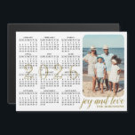 2026 Photo Calendar Magnet Modern Black White Gold<br><div class="desc">This modern 2026 magnetic calendar designed in minimalist style is easy to customise with personal photo to create a unique keepsake. The white and black design with a colourful picture and golden text is the template where you can type your family name and add own picture. Click "Personalise" (or "View...</div>