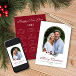 2026 Pine Arch Dark Red Christmas Photo Calendar Holiday Card<br><div class="desc">2026 Pine Arch Dark Red Christmas Photo Calendar Holiday Card featuring your favourite photo in our modern arch. The back has a 2026 calendar for a lasting memory. Gentle modern greenery of pine and berries perfectly suits this elegant botanical holiday card. 🌟This is for 2026🌟 Please contact us at cedarandstring@gmail.com...</div>