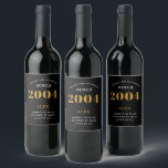 21st Birthday Name 2004 Black Gold Elegant Chic Wine Label<br><div class="desc">2004 Vintage 21st Birthday Black & Gold Elegant Wine Label. Celebrate your milestone with our exclusive birthday wine label. The meticulously designed label with stunning black and gold hues effortlessly enhances the visual appeal of your favourite wine. The year prominently featured on the label, adds a nostalgic throwback to the...</div>
