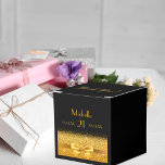 21st birthday party black gold thank you favour box<br><div class="desc">Elegant, classic, glamourous and feminine style favour box. A gold coloured ribbon and bow with golden glitter and sparkle, a bit of bling and luxury for a 21st birthday party. Black background. With the text: Thank You! on top. Front: Templates for a name, age 21 and date of birth and...</div>