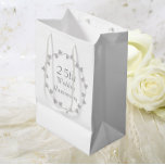 25th Silver Wedding Anniversary Ivy Wreath Medium Gift Bag<br><div class="desc">Present your gifts to the married celebrants with this 25th Silver Wedding Anniversary gift bag that features a silver colour ivy wreath design and stylised lettering. Select your gift bag size.</div>