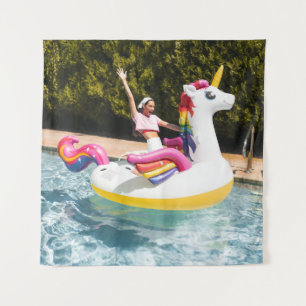 2 children riding on white and red inflatable boat tapestry