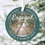 2 Photo 1st Christmas Engaged Elegant Green White Ornament<br><div class="desc">Celebrate the joyful 1st holiday of your engagement with a custom 2 photo "Our First Christmas Engaged" round acrylic ornament. All text and images on this template are simple to personalise and can be different or the same on front and back. (IMAGE & TEXT DESIGN TIPS: 1) To adjust position...</div>