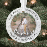 2 Photo Engagement 1st Christmas Faux Marble Ornament<br><div class="desc">Celebrate the joyful 1st holiday of your engagement with a custom 2 photo "Our First Christmas Engaged" round faux marble acrylic ornament. All text and images on this template are simple to personalise and can be different or the same on front and back.(IMAGE & TEXT DESIGN TIPS: 1) To adjust...</div>