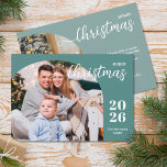 2 photos Christmas arch modern minimalist Holiday Card<br><div class="desc">This elegant and modern Christmas greeting card features a minimalist design displaying 2 of your favourite family pictures inside trendy arch frames. Easily customisable with your family name and the current year in stylish serif fonts over a modern teal background on the front and with your personal greeting message in...</div>