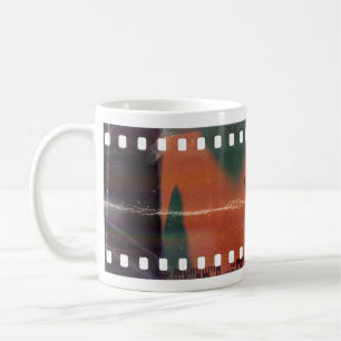 35mm filmstrip start, cool scratches. coffee mug