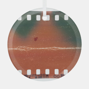 35mm filmstrip start, cool scratches. glass tree decoration