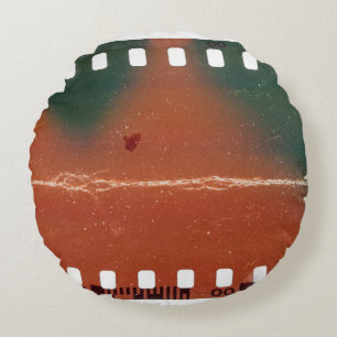 35mm filmstrip start, cool scratches. round cushion