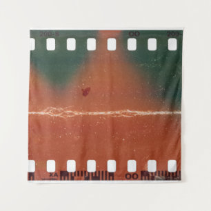 35mm filmstrip start, cool scratches. tapestry
