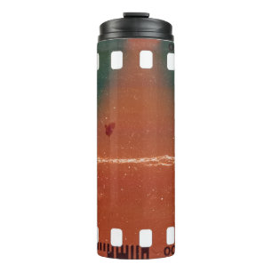 35mm filmstrip start, cool scratches. thermal tumbler