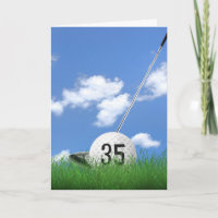 35th birthday golf ball in grass