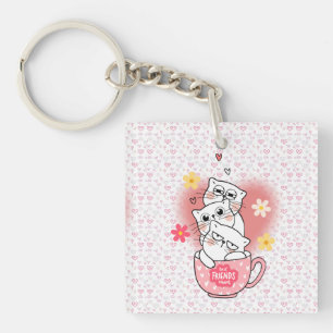 3 cats with flowes and a mug key ring