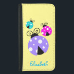3 Ladybugs in Purple Pink and Blue Personalised Samsung Galaxy S5 Wallet Case<br><div class="desc">Some whimsical and cute ladybugs. These brightly coloured ladybugs have delightful round bodies with cute white polka dots across the back. Their heads are a half moon shape in black and have cute curly shaped feelers. These 3 ladybugs are painted bright purple, pink and blue. Personalise / customise with a...</div>