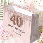 40th birthday blush pink rose gold drips large gift bag<br><div class="desc">Elegant, classic, glamourous and girly for a 40th birthday party. A blush pink background. Decorated with rose gold, pink drips, paint dripping look. Personalise and add a name. With the text: Happy Birthday. The name is written with a modern dark rose coloured hand lettered style script. Number 40 is written...</div>