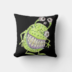 4 eyed green alien monster cushion