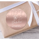 50 Fabulous Birthday Party Rose Gold Glitter Classic Round Sticker<br><div class="desc">Send out your fiftieth birthday party invitations and correspondence sealed with these elegant and chic personalized stickers. "50 & Fabulous" is written in stylish white script against a rose gold background,  with rose gold faux glitter dripping from the top. You can personalize with your name.</div>