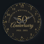 50th Anniversary Black And Gold Dust Confetti  Large Clock<br><div class="desc">Featuring delicate gold dust confetti on a black background. Personalise with your special fifty years golden anniversary information in chic gold lettering. Designed by Thisisnotme©</div>
