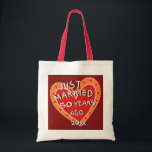50th Anniversary or Any Yr Funny Romantic Gift Tote Bag<br><div class="desc">A one-of-a-kind, fun anniversary gift for family or friends. What a conversation starter when they're out and about shopping or toting their treasures around. Whimsy is the word for this red and orange decorated heart proclaiming "JUST MARRIED... ..50 YEARS AGO". See more wedding anniversary gifts at Zigglets here at Zazzle....</div>