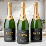50th Birthday Name 1975 Black Gold Elegant Chic Sparkling Wine Label<br><div class="desc">Vintage Birthday Black & Gold Elegant Label. Celebrate your milestone with our exclusive sparkling wine birthday label. The meticulously designed label with stunning black and gold hues effortlessly enhances the visual appeal of your favourite sparkling wine. The year prominently featured on the label, adds a nostalgic throwback to the year...</div>