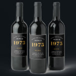 50th Birthday Name 1975 Black Gold Elegant Chic Wine Label<br><div class="desc">1975 Vintage 50th Birthday Black & Gold Elegant Wine Label. Celebrate your milestone with our exclusive birthday wine label. The meticulously designed label with stunning black and gold hues effortlessly enhances the visual appeal of your favourite wine. The year prominently featured on the label, adds a nostalgic throwback to the...</div>