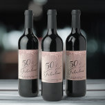 50th Birthday Rose Gold Glitter Personalised Wine Label<br><div class="desc">Celebrate your fiftieth birthday in style with these elegant and chic personalised wine labels. "50 & Fabulous" is written in stylish script against a rose gold background,  with rose gold faux glitter dripping from the top. You can personalise with your name and party date.</div>