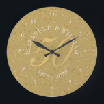50th Wedding Anniversary Gold Dust Confetti Large Clock<br><div class="desc">50TH WEDDING ANNIVERSARY GOLD DUST CONFETTI CLOCK. Personalized with your names in white with a faux gold drop shadow and a beautiful script "50" (or a monogram initial),  on a delicate gold dust confetti background. Designed by Pure Piglet© at www.zazzle.com/purepiglet*.</div>
